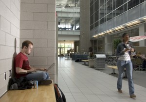 MSU student using a laptop on campus