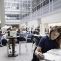 Students studying and using laptops at Michigan State University.