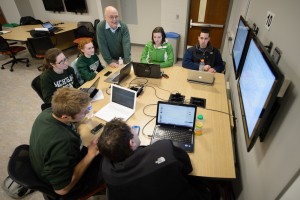 A faculty membe rinteracts with students in an MSU Room for Engaged and Active Learning