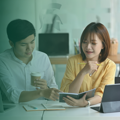 Two Asian students studying together